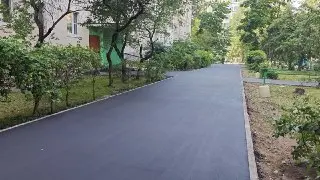 Асфальтирование во дворах авиаграда: новые работы на Лацкова и других улицах