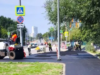 Финальный слой асфальта на Митинской: готовимся к Дню города